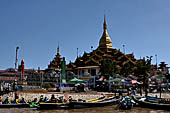 Inle Lake Myanmar. Phaung Daw Oo Paya. Enshrined in the pagoda are five small ancient Buddha images that have been transformed into amorphous blobs by the sheer volume of gold leaf applied by devotees. 